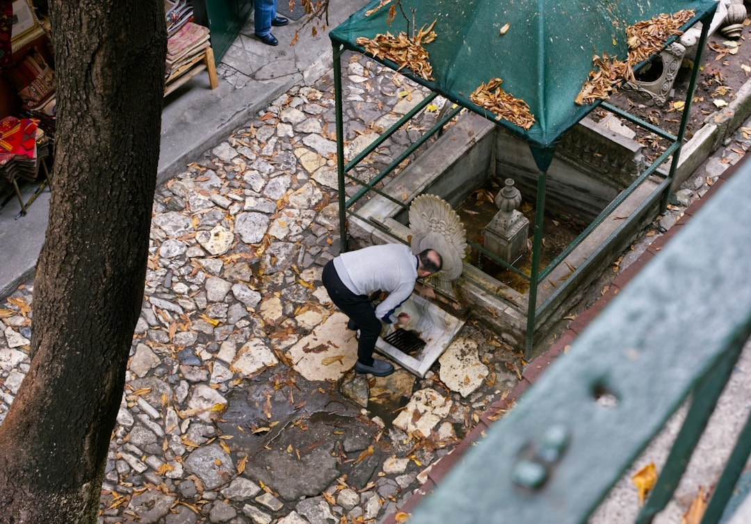 Plumber inspecting a sewer line